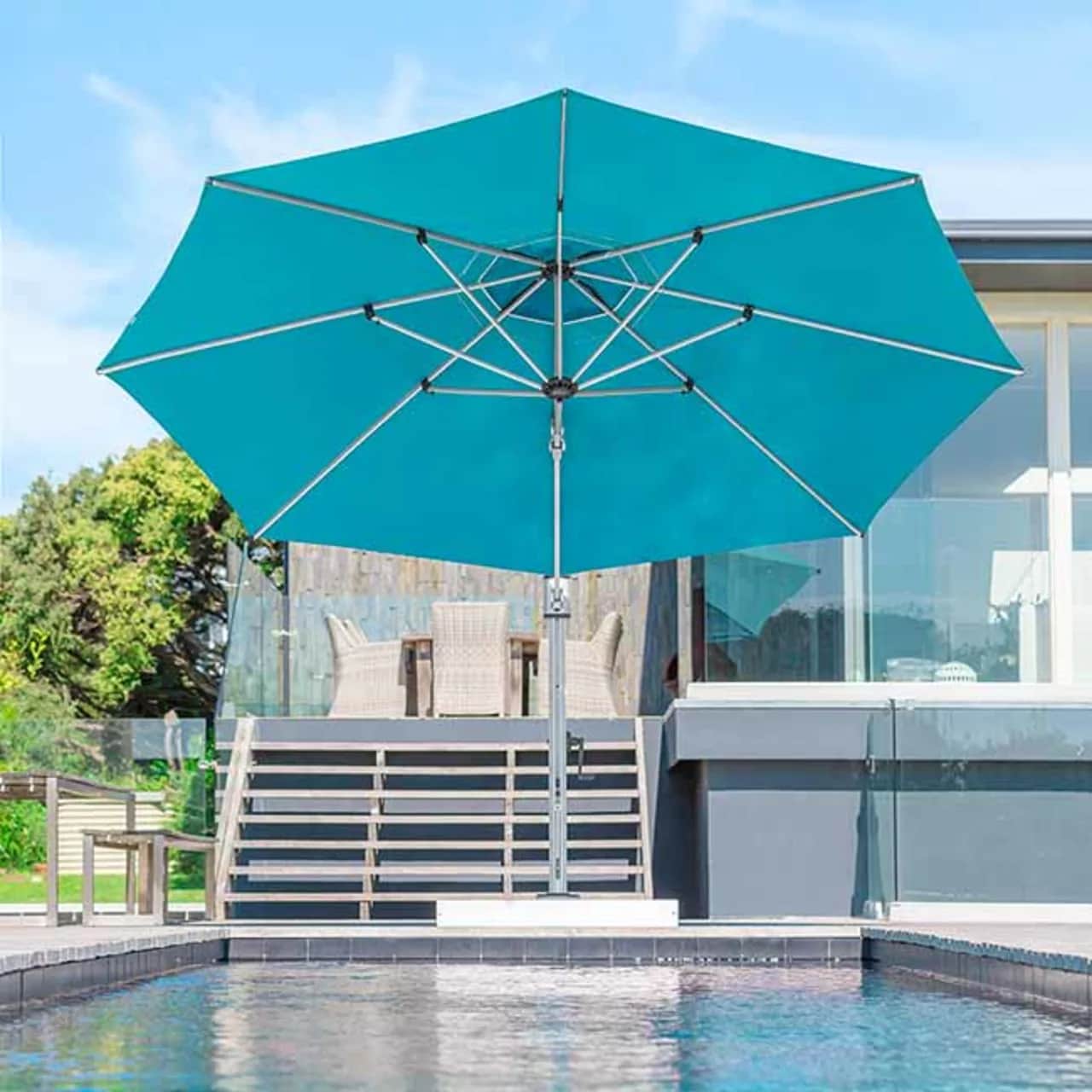 Frankford 13' octagonal Eclipse Cantilever Umbrella in Turquoise Canvas Fabric