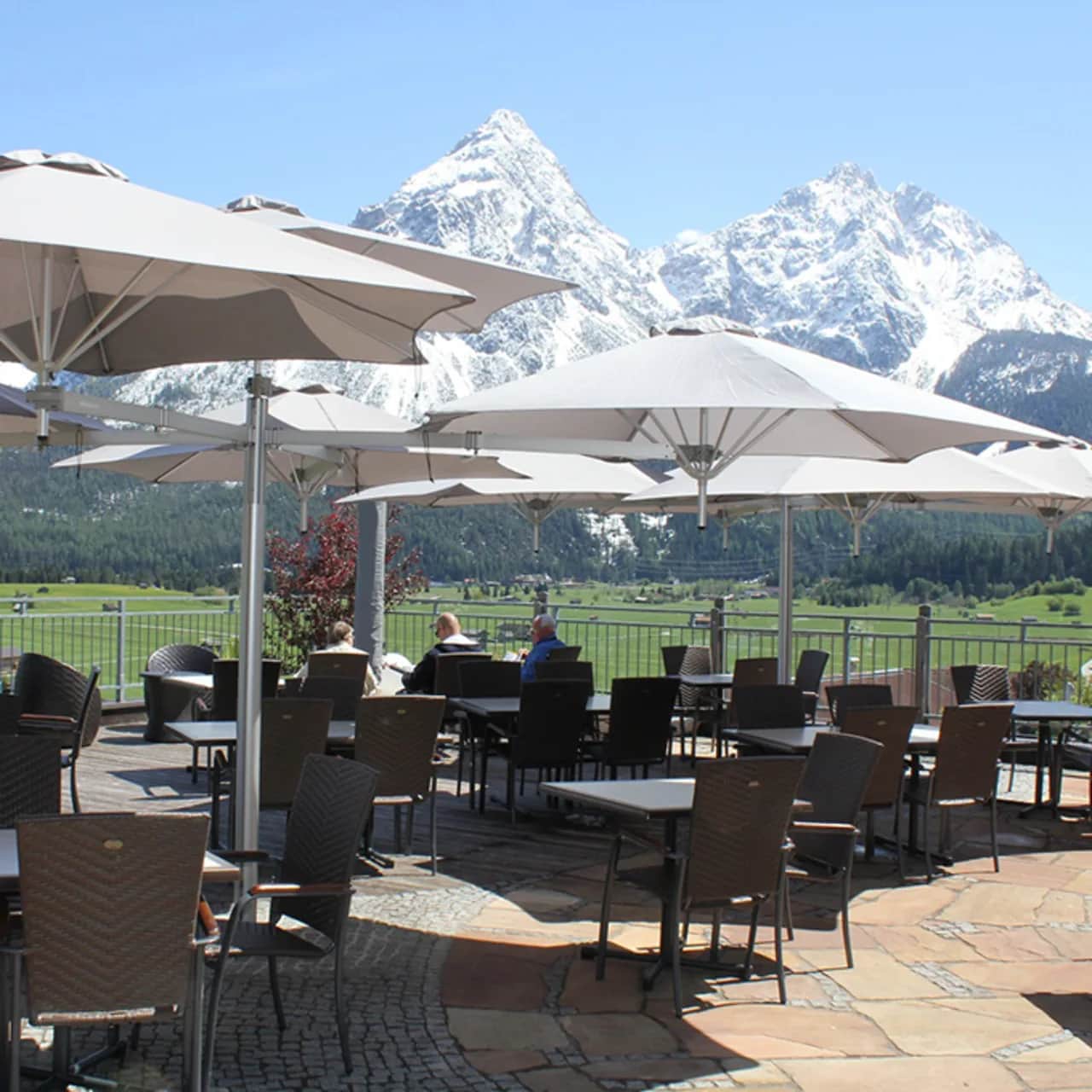 shaded mountain view: umbrosa paraflex flexible arm umbrella four plus one canopy