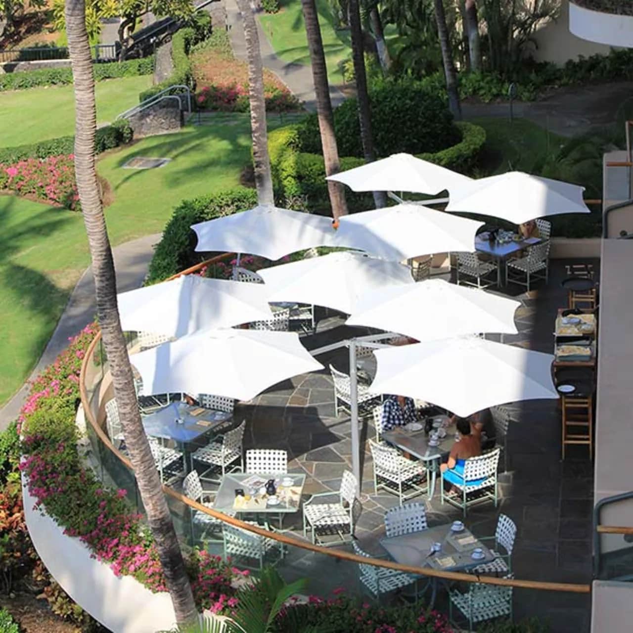 protected from the tropical sun: umbrosa paraflex flexible umbrella with multiple arms