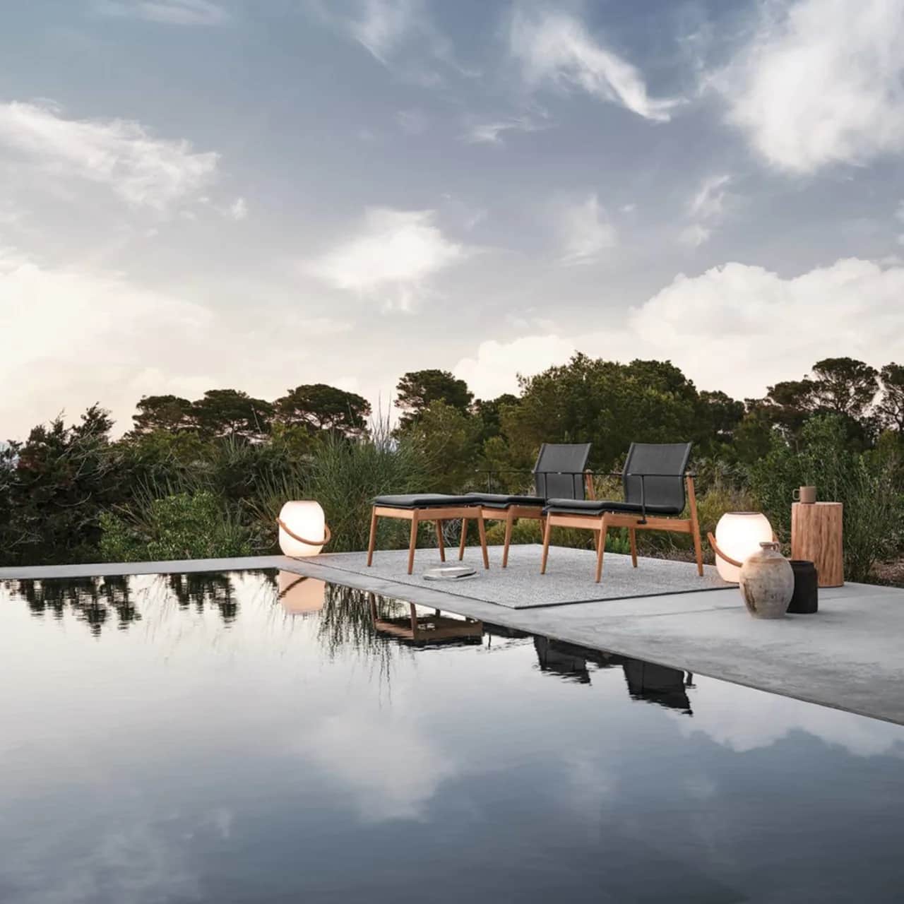 Gloster Sway Lounge Chair & Ottoman | Block Side Table | Ambient Cocoon Outdoor Light