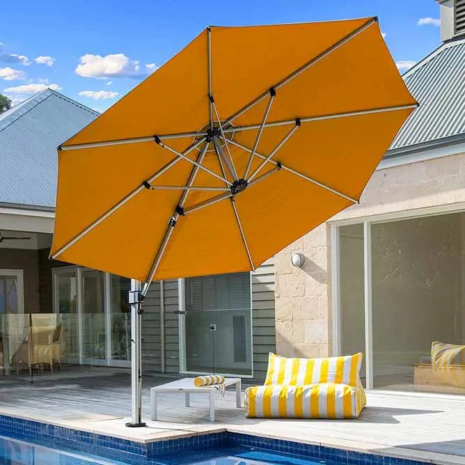 take a splash in color: aurora 11' octagonal premium cantilever pool umbrella in orange