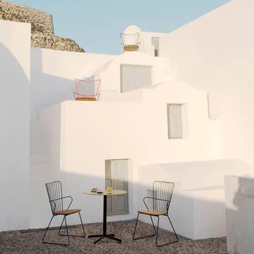 mediterranean flair: paon dining chairs with flor round cafe table